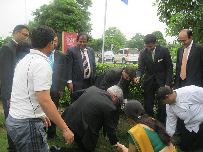 2011-7-29 Men in suits come out to plant! Executives from Crowne Plaza Today Gurgaon planted 100 trees as part of the Million Trees Initiative