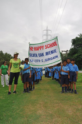 2011-8-11 Children from Happy School, DLF Phase 1 - they were very good at planting and was very happy to get their hands dirty!